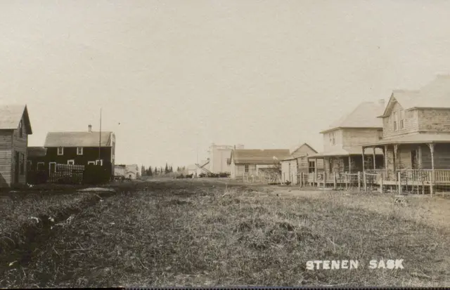 Street view of Stenen with houses and early buildings